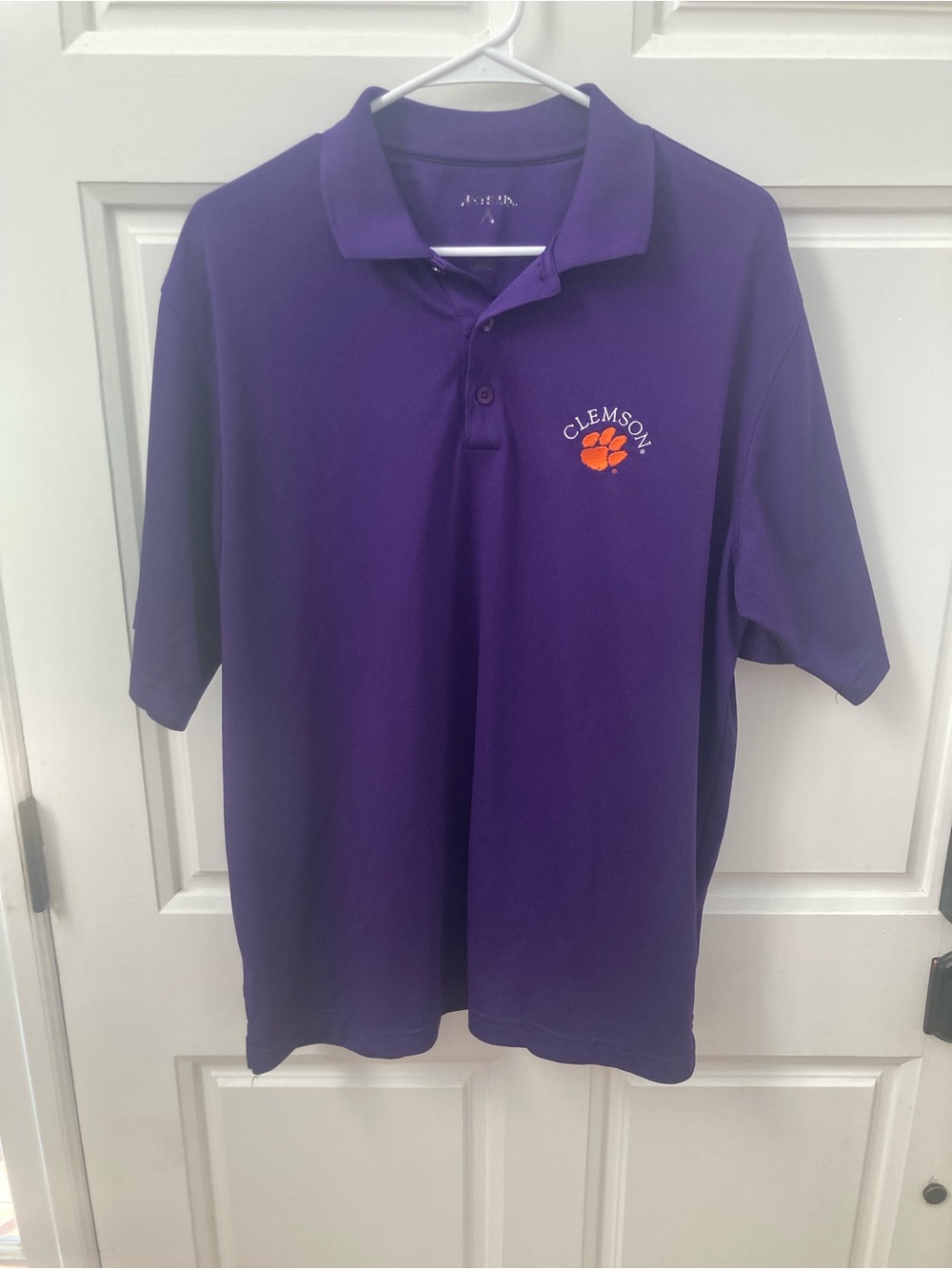 Antigua Clemson Paw Polo in Purple with Orange Logo